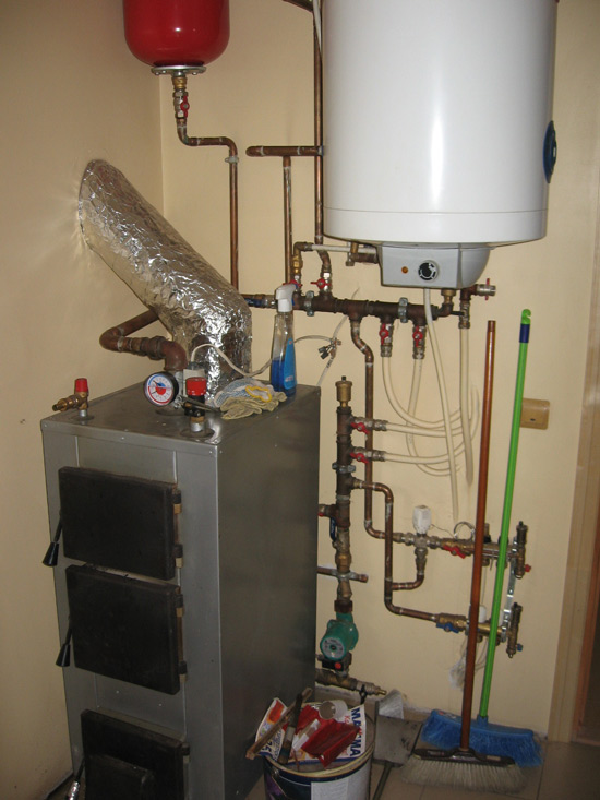 ekonomiskas mājas projekts - kurtuves foto